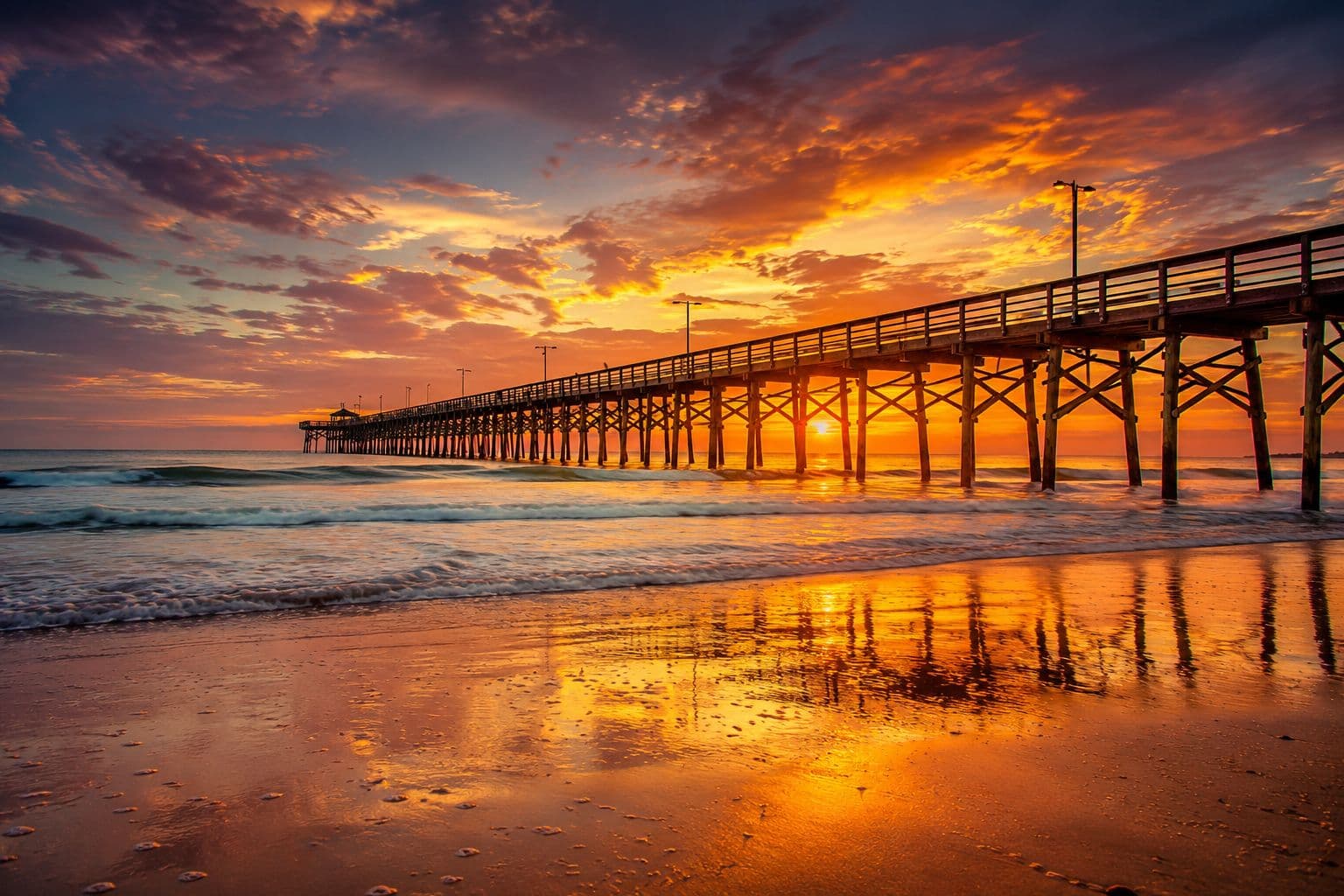 Oak Island pier at sunset